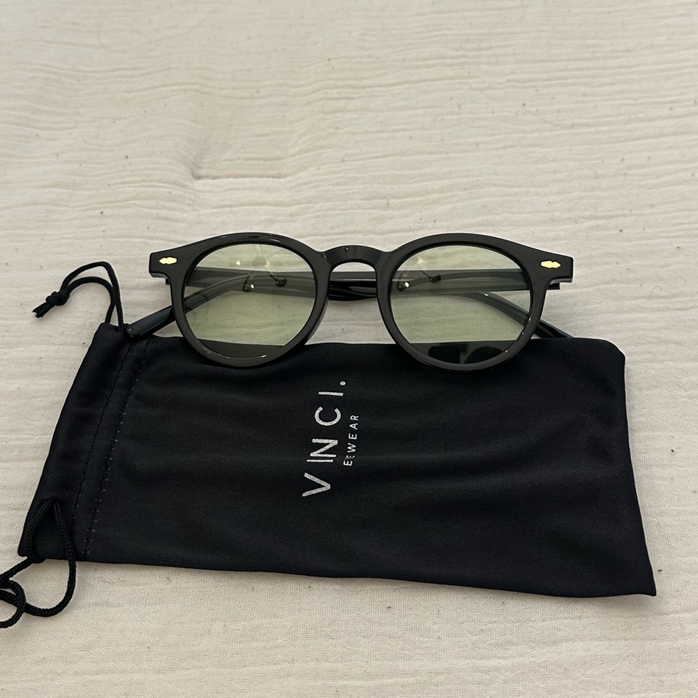Black Sunglasses with Green Lenses